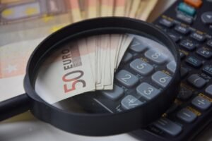 Illustration showing calculation of HELOC monthly payments during draw and repayment periods on a calculator